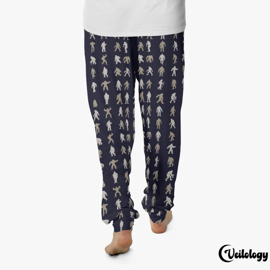 Believe-themed Sasquatch pajama pants with Bigfoot silhouettes