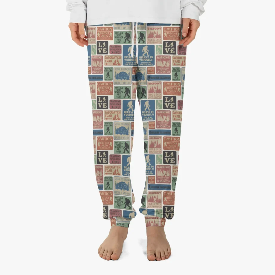 Bigfoot Believe retro pajama pants with Sasquatch-themed signs and messages