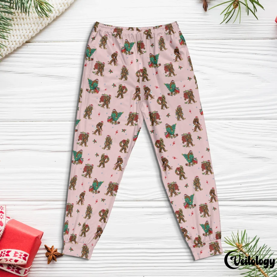 Whimsical Bigfoot PJ pants with Christmas trees and festive holiday patterns