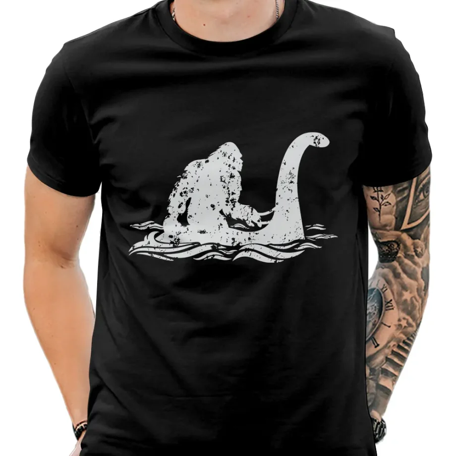 Cryptid shirt featuring Bigfoot riding Nessie in a fun and unique style