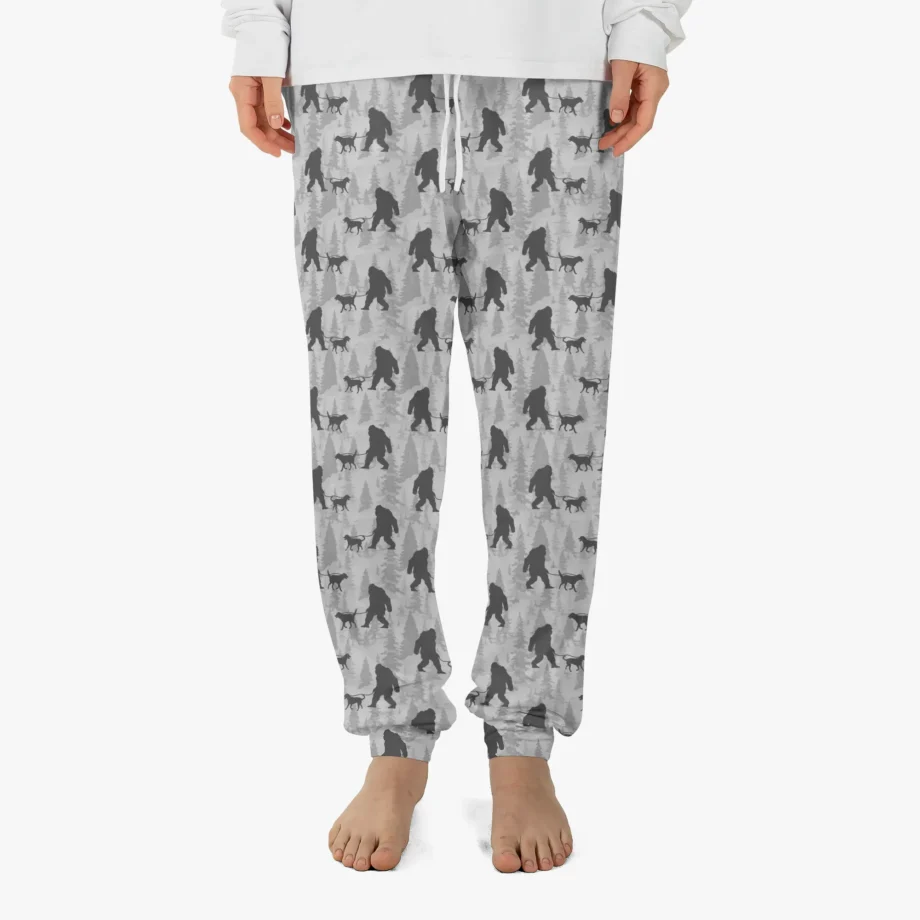 Unisex Sasquatch PJ bottoms with a funny Bigfoot and dog walking design