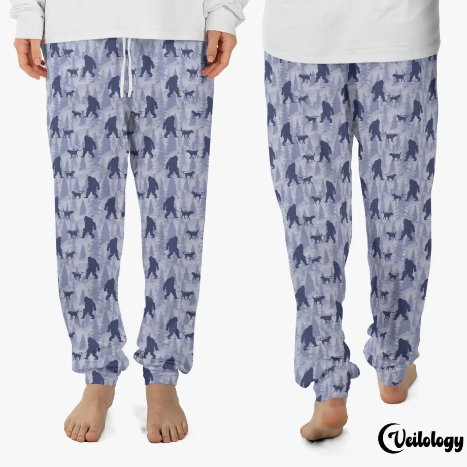 These funny Bigfoot dog pajama pants showcase Sasquatch walking a dog in a quirky and playful design. Perfect for lounging or as a gift for dog lovers, cryptid fans, and Bigfoot believers. Designed for both men and women, they’re as cozy as they are fun