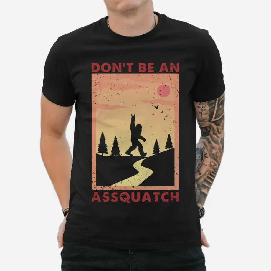 Funny Bigfoot Sasquatch shirt with a retro vintage design and a rock and roll hand sign