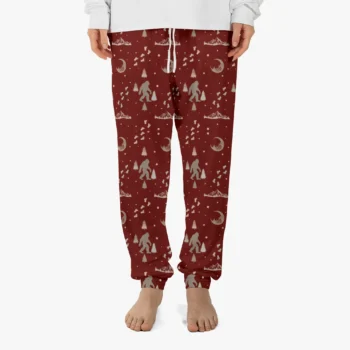 Bigfoot pajama pants with Sasquatch footprints and festive holiday design