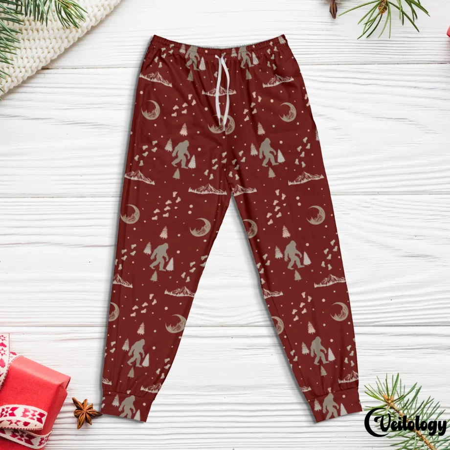 Sasquatch holiday pajama pants with Bigfoot footprints and festive designs