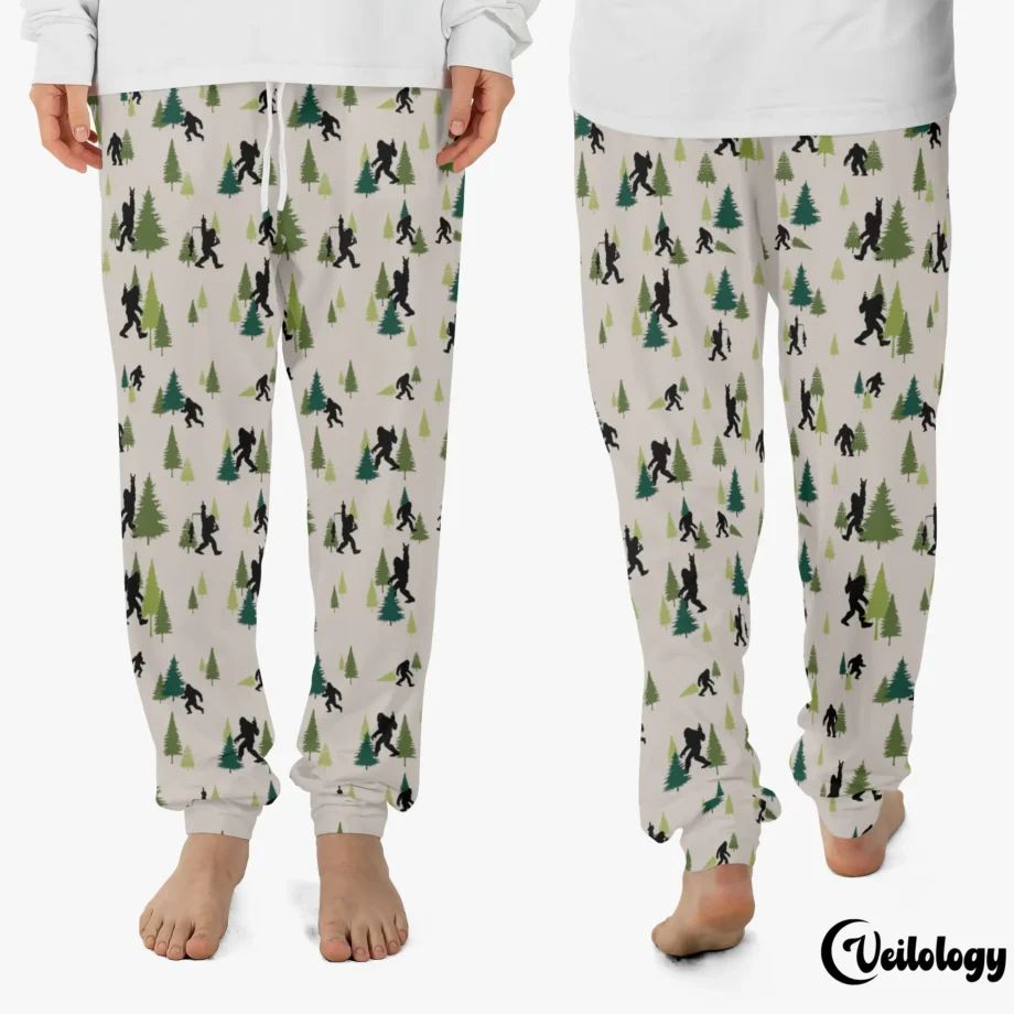 Funny Bigfoot pajama pants with Sasquatch exploring a whimsical forest