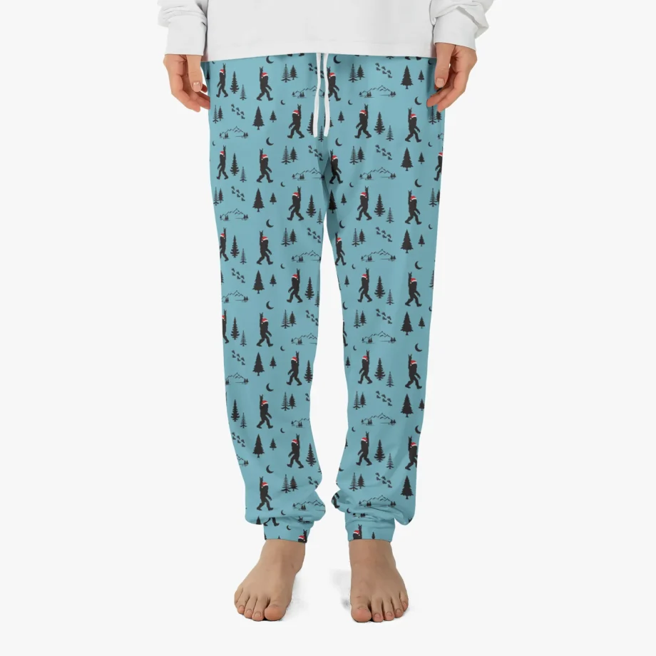 Bigfoot Christmas pajama pants with festive Sasquatch rock-and-roll design