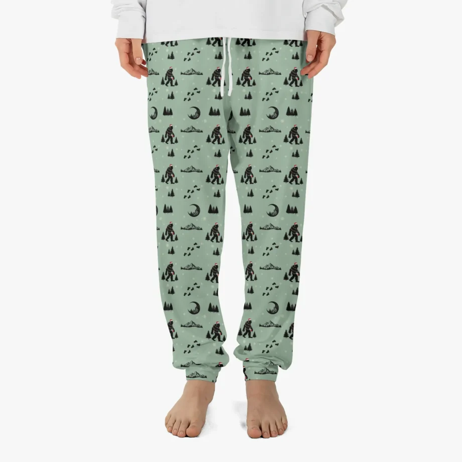 Santa Bigfoot pajama pants with Sasquatch in a Santa hat and festive design