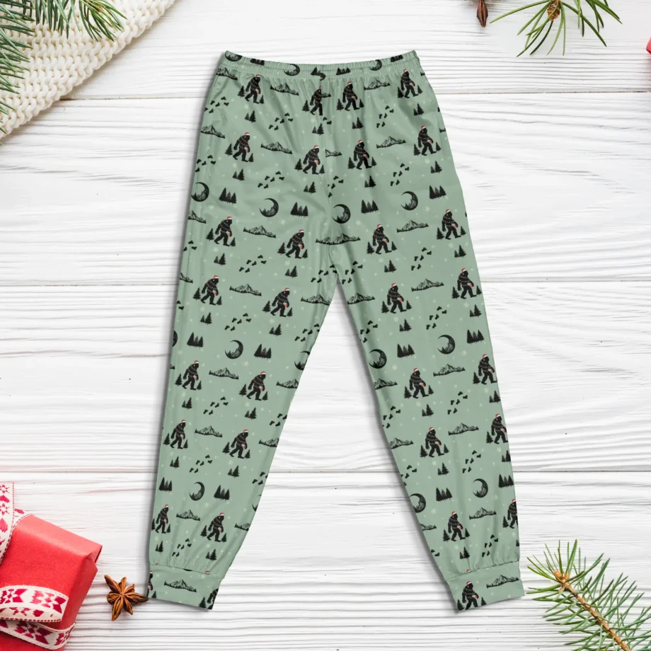 Christmas pajama pants with Bigfoot wearing a Santa hat and festive prints