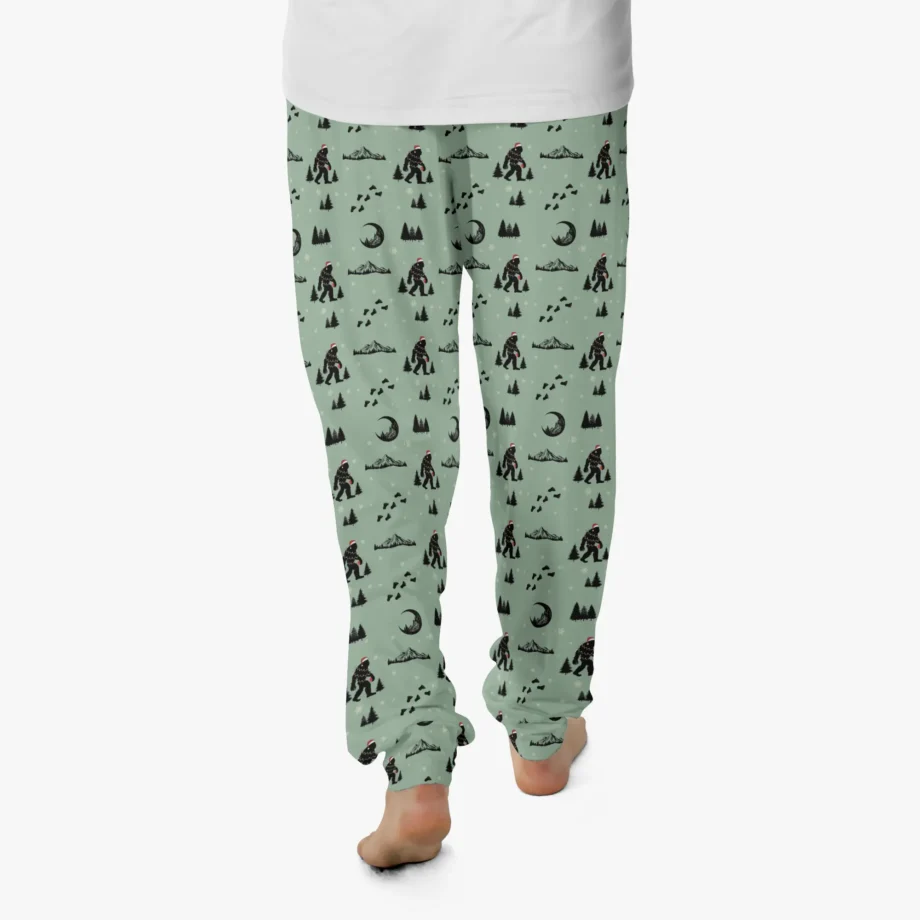 Unisex Christmas PJ bottoms with Sasquatch wearing a Santa hat