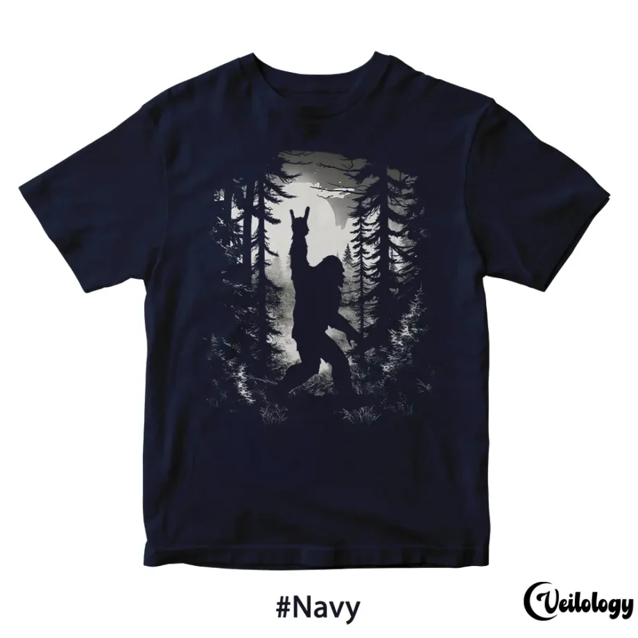 Bigfoot t shirt with Sasquatch in a rock-and-roll pose under forest vibes