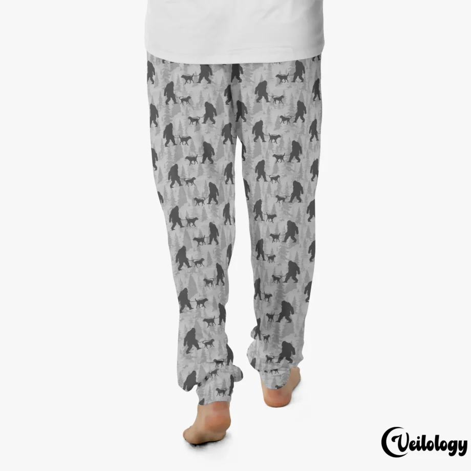 Bigfoot pajama pants featuring Sasquatch walking a dog in a fun pattern