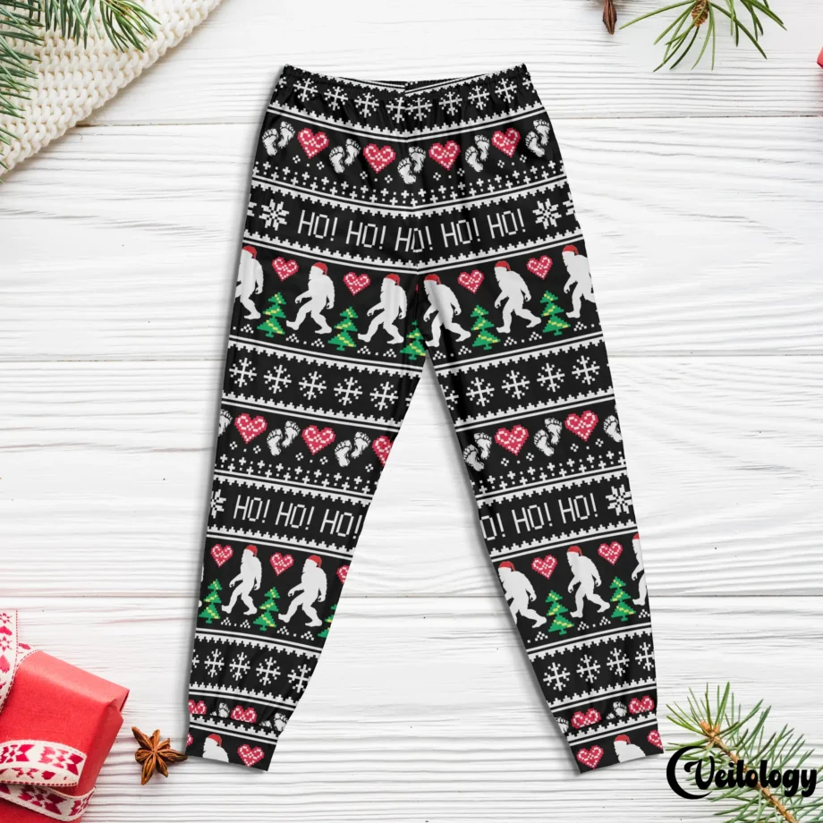 Ugly Christmas Bigfoot pajama pants with Santa Sasquatch and holiday-themed design