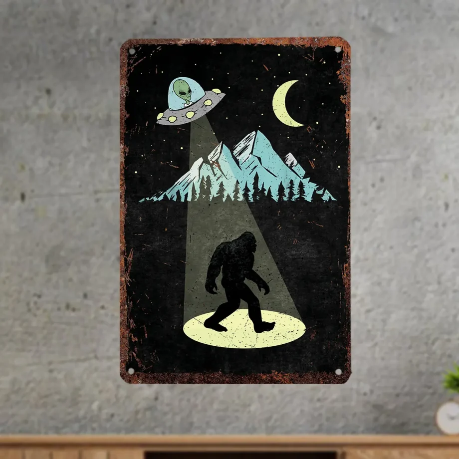 Vintage Bigfoot tin sign with UFO and extraterrestrial design