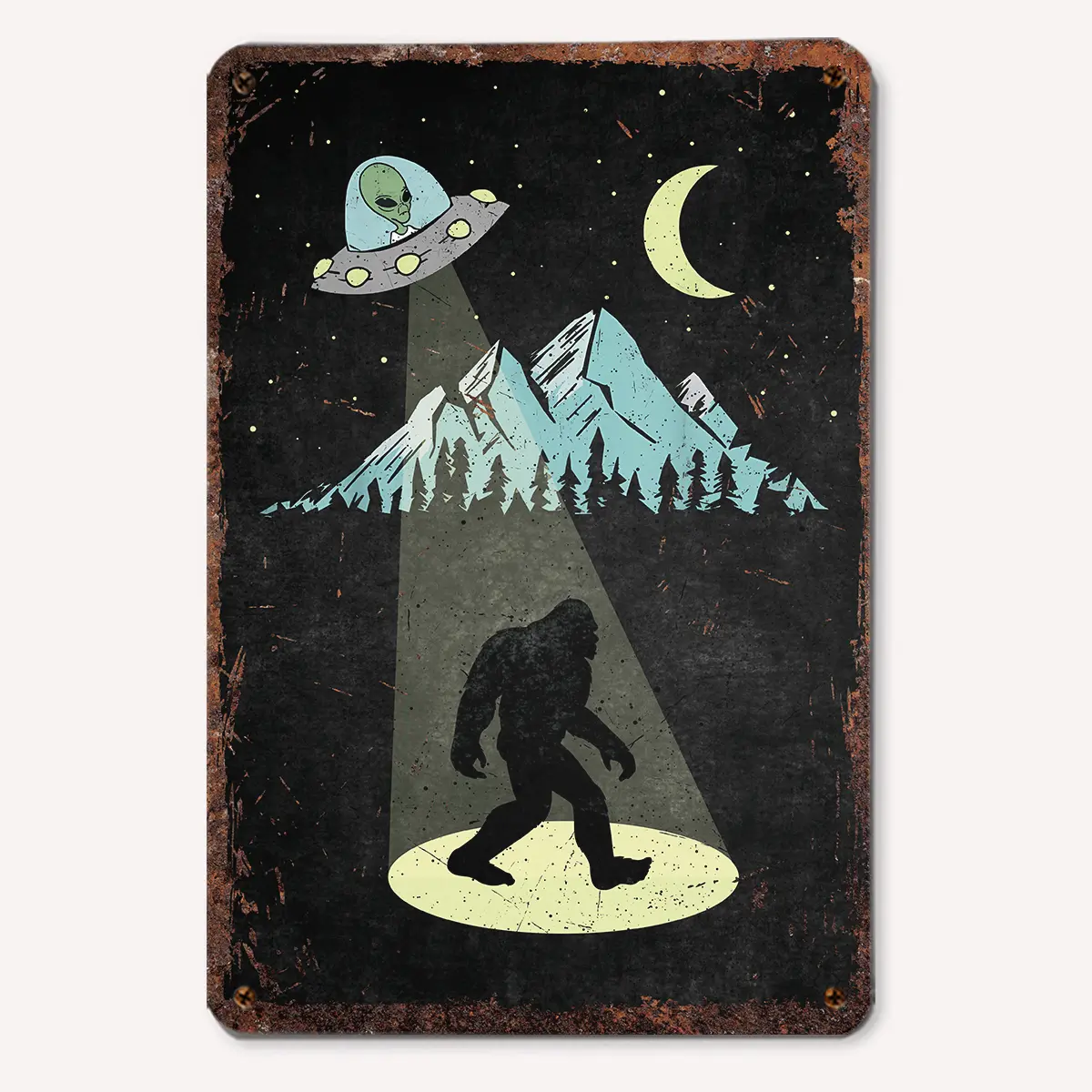 Rustic metal sign featuring a silhouette of Bigfoot illuminated by a UFO's spotlight, with a crescent moon, stars, and a mountain backdrop