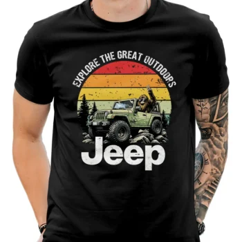 Bigfoot Jeep T-shirt with Sasquatch driving a green Jeep and retro sunset design