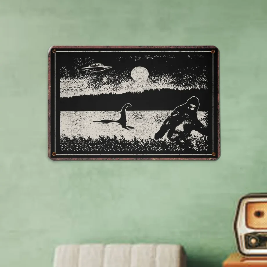 Sasquatch and Nessie wall art with UFO design on a tin sign