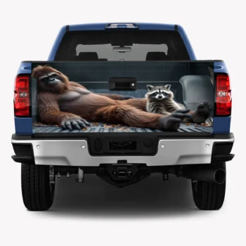 Bigfoot truck tailgate wrap featuring Sasquatch lounging with a raccoon for funny car decor