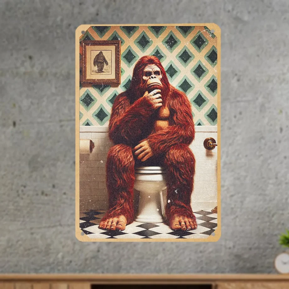 Bigfoot bathroom tin sign featuring Sasquatch thinking on a toilet funny decor