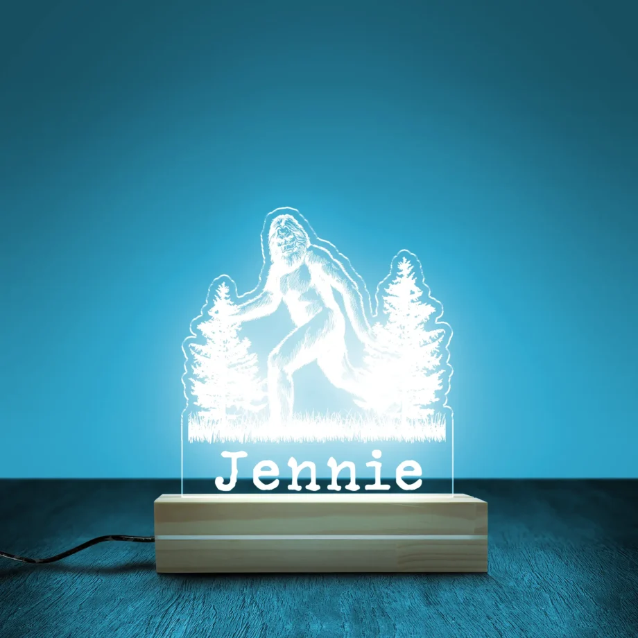 Custom Sasquatch night light with personalized text and glowing pine tree design