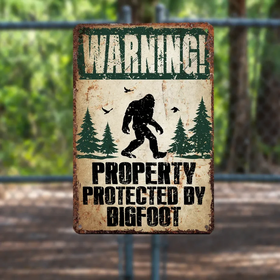 Bigfoot metal tin sign warning 'Property Protected by Sasquatch' for home decor