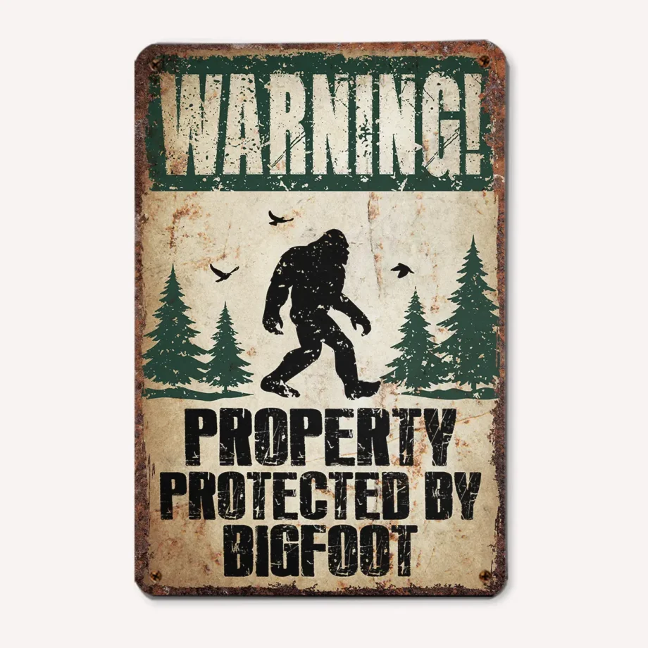 Vintage Bigfoot tin sign with 'Property Protected by Sasquatch' warning